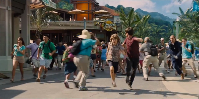 Main Street of Jurassic World under attack. Maybe opening a franchise of Jimmy Buffett's Margaritaville restaurants on Isla Nublar wasn't such a good idea, after all. Image courtesy of Universal Pictures.